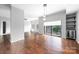 Bright living room with hardwood floors, city views, and a built-in bar area at 715 N Church St # 513, Charlotte, NC 28202