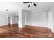 Expansive living area featuring hardwood floors, neutral walls, and modern lighting fixtures at 715 N Church St # 513, Charlotte, NC 28202