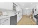 Spacious kitchen with stainless steel appliances and white cabinetry, ample counter space at 715 White Oaks Cir, Monroe, NC 28110