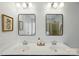 Bathroom featuring a double sink vanity with framed mirrors and pendant lighting at 78114 Rillstone Dr, Lancaster, SC 29720