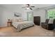 Calm bedroom featuring neutral decor, soft lighting, a ceiling fan and lots of space at 78114 Rillstone Dr, Lancaster, SC 29720