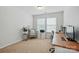 Bright home office featuring a custom desk, great natural light and lots of space at 78114 Rillstone Dr, Lancaster, SC 29720