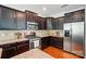 Well-equipped kitchen with stainless steel appliances and sleek, dark cabinetry at 78114 Rillstone Dr, Lancaster, SC 29720