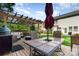 Back deck featuring a large dining table and an umbrella for enjoyable outdoor dining at 10237 Broken Stone Ct, Charlotte, NC 28214