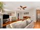 Inviting living room with hardwood floors, neutral walls, and comfortable furnishings at 10237 Broken Stone Ct, Charlotte, NC 28214