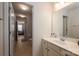 Bathroom featuring a single vanity and a mirror, offering a bright and functional space at 104 Wingstem Ct, Mooresville, NC 28117