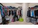 Walk-in closet featuring ample clothing and storage solutions with shelves and hanging racks at 104 Wingstem Ct, Mooresville, NC 28117