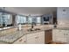 Kitchen featuring beautiful stone countertops and stainless steel dishwasher at 104 Wingstem Ct, Mooresville, NC 28117