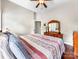 Bedroom features hardwood floors, a ceiling fan, and natural light from the windows at 106 Pier Point Dr, Stony Point, NC 28678