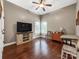 Bedroom features hardwood floors and natural light from the windows at 106 Pier Point Dr, Stony Point, NC 28678