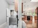Well-equipped laundry room with modern appliances and ample space for laundry tasks, conveniently located near the kitchen at 106 Pier Point Dr, Stony Point, NC 28678