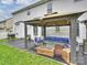 Inviting backyard patio with a cozy seating area, perfect for outdoor entertaining and relaxation at 11332 Anna Rose Rd, Charlotte, NC 28273