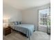 Cozy bedroom with carpet flooring, ample natural light, and neutral decor at 11332 Anna Rose Rd, Charlotte, NC 28273