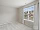 Cozy bedroom with natural light and neutral-colored walls at 11332 Anna Rose Rd, Charlotte, NC 28273