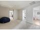 Spacious bonus room with neutral carpeting and multiple entryways at 11332 Anna Rose Rd, Charlotte, NC 28273