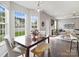 Dining room features large windows and open access to the kitchen and living areas at 11332 Anna Rose Rd, Charlotte, NC 28273