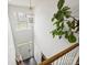 Bright foyer with high ceilings, a decorative light fixture, and hardwood floors at 11332 Anna Rose Rd, Charlotte, NC 28273