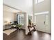 Welcoming foyer featuring dark hardwood floors and bright, neutral paint at 11332 Anna Rose Rd, Charlotte, NC 28273