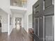 Inviting foyer with dark wood flooring, soaring ceilings, and bright neutral paint at 11332 Anna Rose Rd, Charlotte, NC 28273