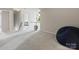 Bright hallway with open floor plan, a house plant, and neutral decor at 11332 Anna Rose Rd, Charlotte, NC 28273