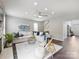 Spacious living room with hardwood flooring, modern furniture, and a ceiling fan at 11332 Anna Rose Rd, Charlotte, NC 28273