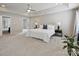 Spacious main bedroom with tray ceiling, ceiling fan, and ensuite bathroom at 11332 Anna Rose Rd, Charlotte, NC 28273