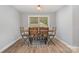 Simple dining area with a rustic table and modern chairs at 135 Oak Creek Dr, Rockwell, NC 28138