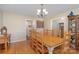 Dining area with hardwood floors and decorative display cabinet at 135 Oak Creek Dr, Rockwell, NC 28138