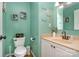 Cute half bath featuring decorative wall art and a modern vanity at 135 Oak Creek Dr, Rockwell, NC 28138