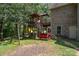 Backyard featuring a playset with a slide, swings, and a climbing ladder at 135 Oak Creek Dr, Rockwell, NC 28138