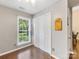 Cozy bedroom with closet, hardwood floors, a large window, and natural light at 13600 Seastone Ln, Pineville, NC 28134