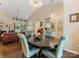 Open concept with dining room, living room, and kitchen areas at 13600 Seastone Ln, Pineville, NC 28134