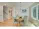 Charming breakfast nook with a round table and comfortable seating, bathed in natural light from large windows at 18205 Royal Oak Rd, Charlotte, NC 28278