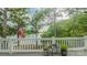 Scenic deck offering a serene view of the lake, perfect for relaxing and entertaining outdoors at 18205 Royal Oak Rd, Charlotte, NC 28278
