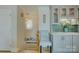 Charming hallway with custom cabinets, glass doors, and stylish backsplash, offering both functionality and visual appeal at 18205 Royal Oak Rd, Charlotte, NC 28278