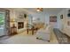 Inviting living room with a cozy fireplace, neutral decor, and abundant natural light, creating a warm atmosphere at 18205 Royal Oak Rd, Charlotte, NC 28278