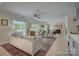 Open-concept living room with a fireplace and easy access to the deck, offering a blend of comfort and style at 18205 Royal Oak Rd, Charlotte, NC 28278