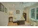 Cozy sitting room with ample natural light, creating a comfortable and inviting space for relaxation at 18205 Royal Oak Rd, Charlotte, NC 28278