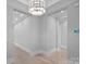 Bright hallway with hardwood floors, recessed lighting, and crown molding at 19329 Watermark Dr # 422, Cornelius, NC 28031