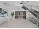 Elegant lobby with sleek staircase, artwork, and stylish entryway doors at 19329 Watermark Dr # 422, Cornelius, NC 28031