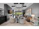 Modern lounge with fireplace, coffered ceiling, TV, and stylish seating area at 19329 Watermark Dr # 422, Cornelius, NC 28031