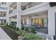 The patio offers outdoor seating and lush landscaping, perfect for relaxing or entertaining guests at 19329 Watermark Dr # 422, Cornelius, NC 28031
