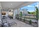 The outdoor patio offers relaxing seating with scenic views of lush landscaping and a community pool at 19329 Watermark Dr # 422, Cornelius, NC 28031