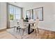 Elegant dining room with large window, modern decor, and comfortable seating at 223 Halemarg Dr, Belmont, NC 28012