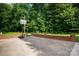 Outdoor basketball court area with brick perimeter, perfect for recreation at 232 Harmony Hills Dr, Catawba, SC 29704