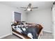 Bedroom featuring a cow print bedding and a rustic ceiling fan at 232 Harmony Hills Dr, Catawba, SC 29704