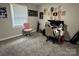 Bright bedroom featuring plush carpet, neutral walls, a large window, and lots of space at 232 Harmony Hills Dr, Catawba, SC 29704