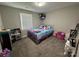 Colorful bedroom featuring plush carpet, neutral walls, a large window, and lots of space at 232 Harmony Hills Dr, Catawba, SC 29704