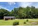 Charming single-story home with a well-manicured lawn and mature trees, offering serene curb appeal at 232 Harmony Hills Dr, Catawba, SC 29704