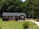 Charming brick home with a well-maintained lawn and a basketball hoop, offering a welcoming curb appeal at 232 Harmony Hills Dr, Catawba, SC 29704